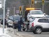 A tow truck clears a crash at the intersection of Sheep Davis Road and Interstate 393 on March 5.