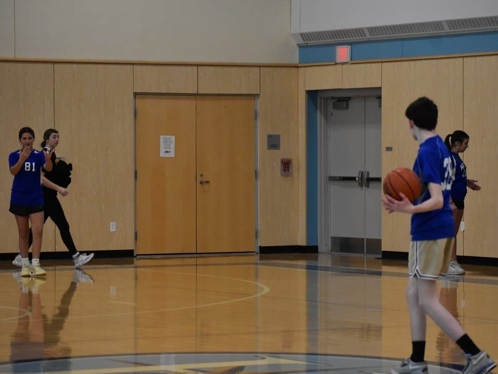The Unified Basketball Program pairs students with and without disabilities on the same team.