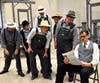 Angry mob led by Bob Ewell (Jeremy Lent) confronts Atticus (Chris Demers).  