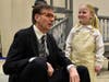 Atticus (Chris Demers) answers a tough question from daughter Scout (Emerson Sullivan). 