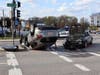 A rollover crash at the intersection of Centre and North Main streets closed the intersection and sent two people to Concord Hospital on May 4.