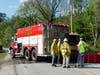 Firefighters battled a brush fire in Concord, not far from the Webster town line on May 20.