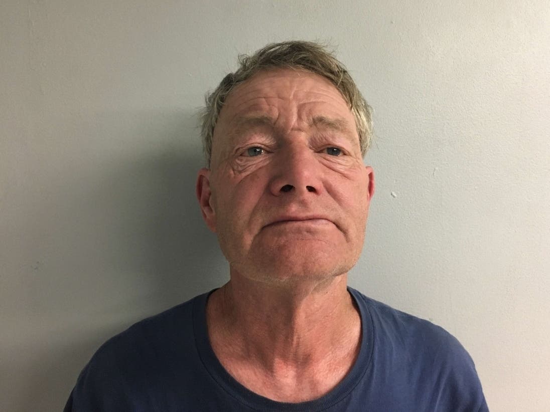 Johnny Burrows was arrested on stalking and violation of a protective order charges after an incident in the Durgin Block Street Garage on May 26.