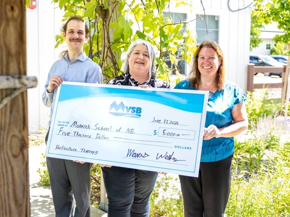 Nicolas Stockman, MVSB Branch & Business Development Manager, Jeanette Souther, Monarch School of New England Executive Director, and Laura Hilliard, MVSB Business Banking Relationship & Operations Manager.