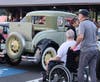 John (seated) and Vynnie at the 2025 NHVH Cruise Night.