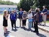 Sen. Jeanne Shaheen visits with officials on Aug. 19 about the Millville Heights Apartments in Salem.