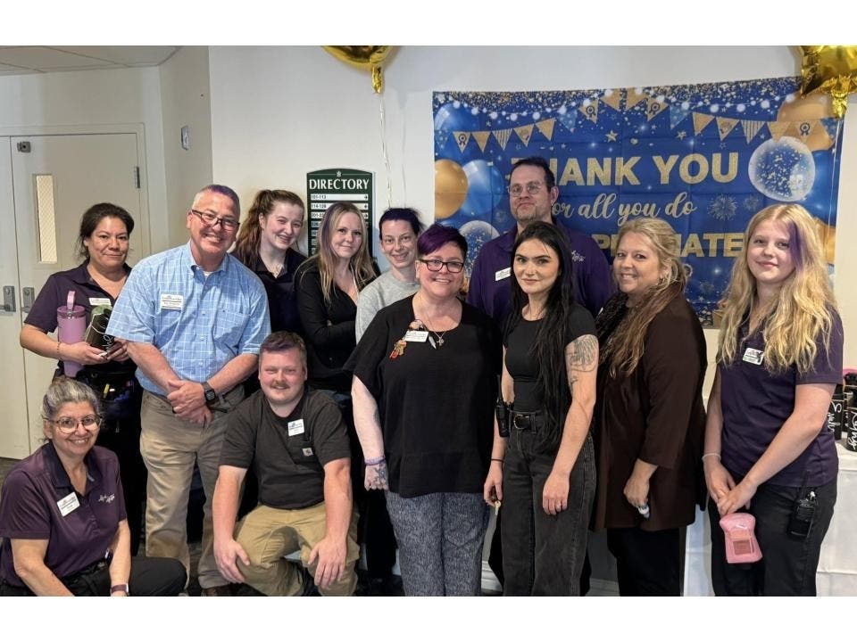 Members of the Ledgewood Bay Care team posing with Ledgewood Bay Executive Director Robert Memmolo.