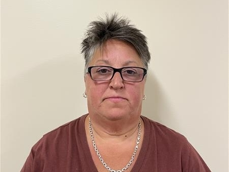 Debora Ann Roukey, a long-time employee of the district, was arrested on his second driving under the influence charge on July 12.
