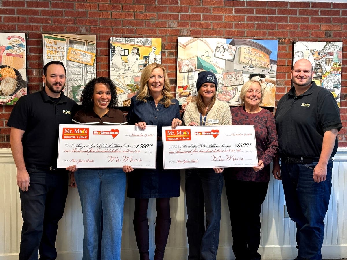 Mr. Mac’s 2025 check presentation of $3,000 from their October Mac Gives Back fundraiser.