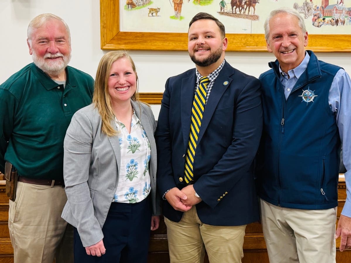 Steve Shurtleff, left, David Lovlien II, center right, and Stuart Trachy, far right, have all endorsed Meghan Hagaman for county attorney.