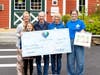 From left are Kay Lacasse, Paintings for a Purpose board member; artist Marc Bard; Beth Dever, Executive Director of the Circle Program; and Maggie McGovern, Communications and Development Manager for the Circle Program.