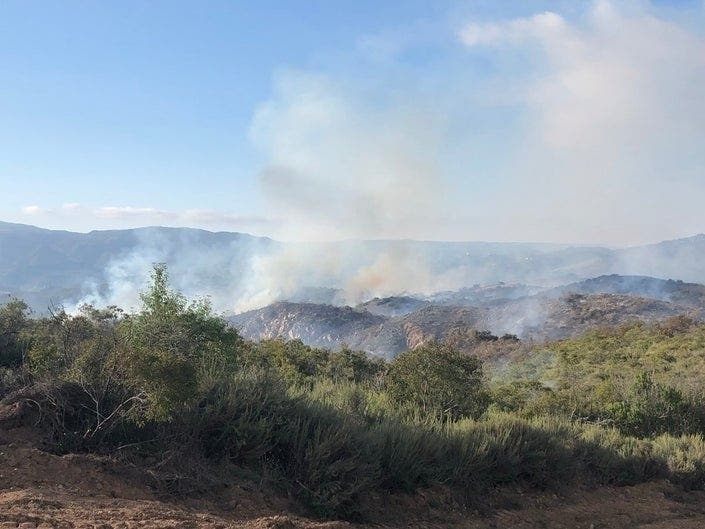 Military and civilian firefighters battled a brush fire on Camp Pendleton.