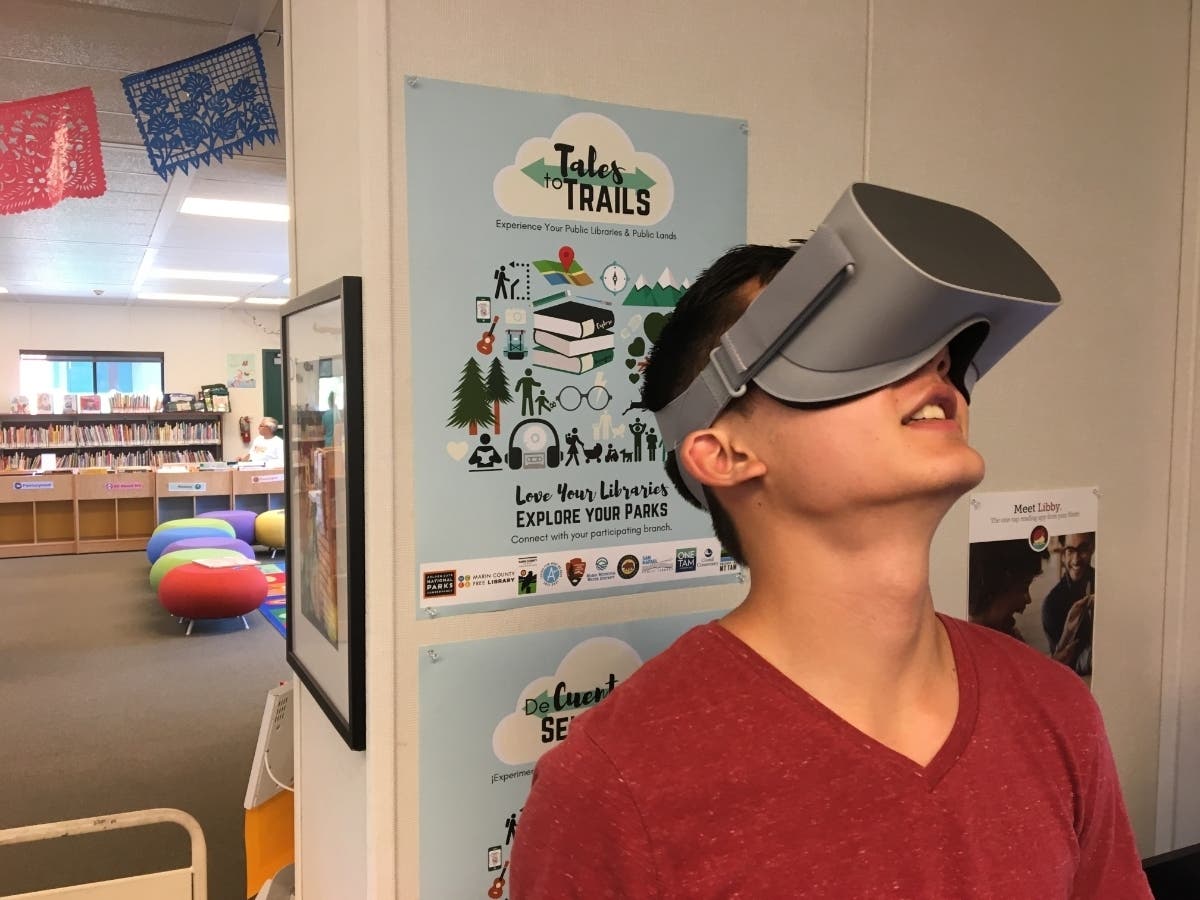 Lucas Luu, a 15-year-old County of Marin student intern, tries out virtual reality at the South Novato Library.