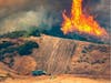 Fire crews battle intense flames in the Tenaja Fire in Southwest Riverside County.