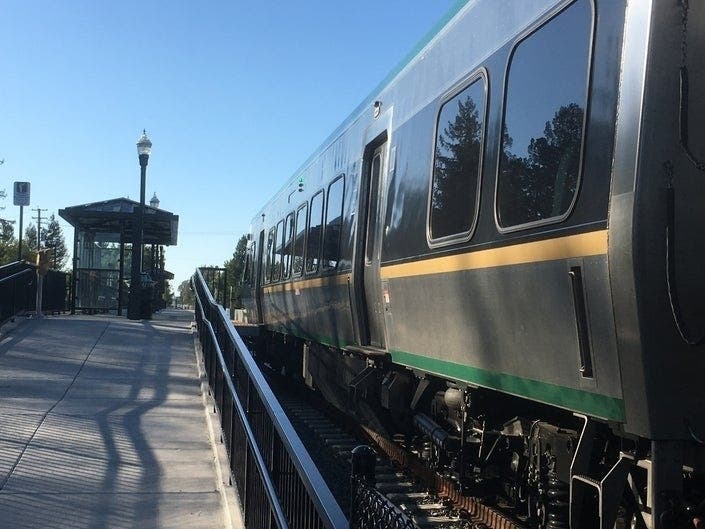 A SMART train pulls into the Rohnert Park station.