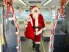 Santa on SMART's Holiday Express Toy Drive Train.
