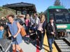 Passengers take the first SMART train on Saturday from Santa Rosa to Larkspur. 