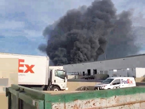 In this video as it appears on the Neighbors app,​ the fire sent a column of thick black smoke over southern San Diego.