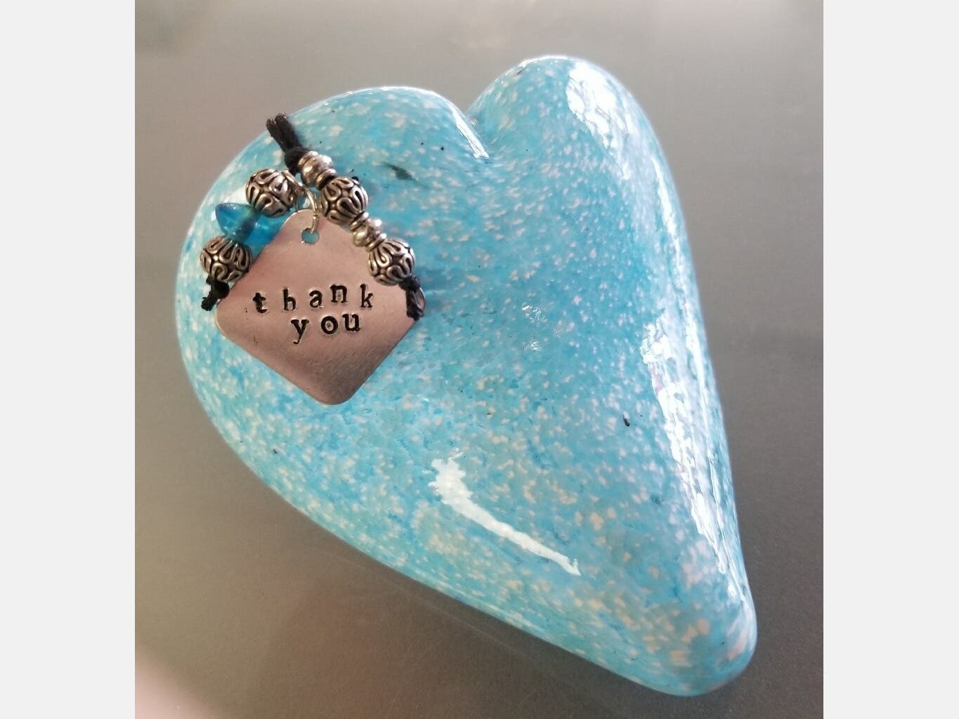 James Stone of Escondido-based Stone & Glass is best known for his use of color and his process of casting glass hot out of the furnace, directly into sculpted metal. 