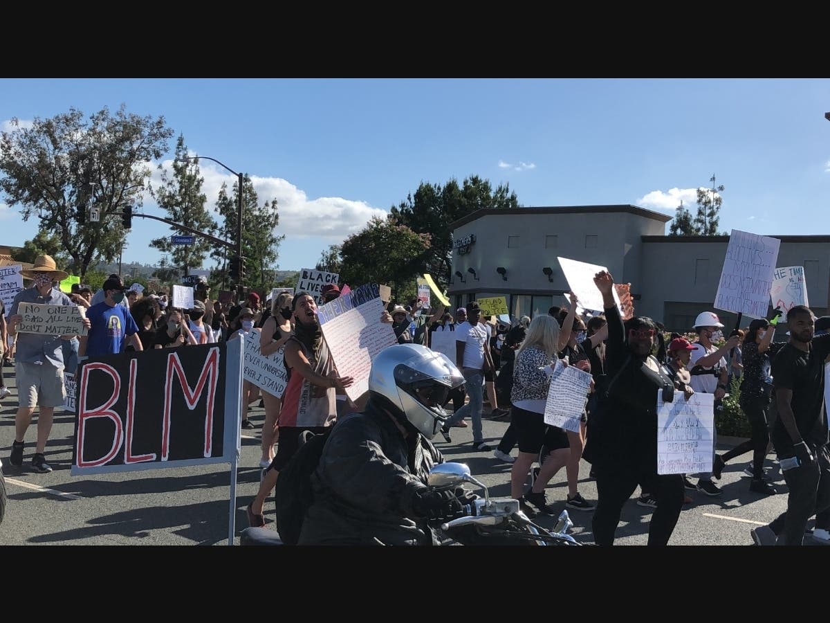 Protestors peacefully marched Sunday in Santee. 