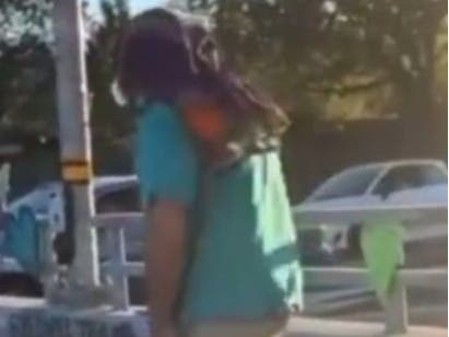 The suspect was described as a heavy-set white male who was wearing a multi-colored cloth face mask, turquoise shirt, khaki pants/shorts, and carrying a broom and a black bucket.