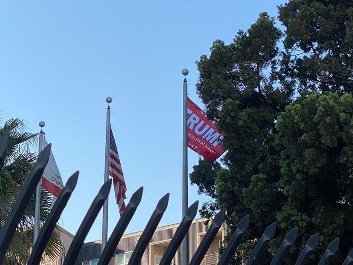 Ian Thomas Malone tweeted a photo of the "Trump" flag that briefly flew at Long Beach Police Headquarters Saturday, Oct. 3. 