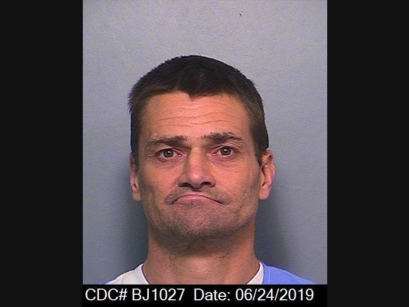 Authorities took Larry Johnson, 51, into custody without incident around 10:30 a.m. Thursday at a hotel in Carlsbad, officials said.