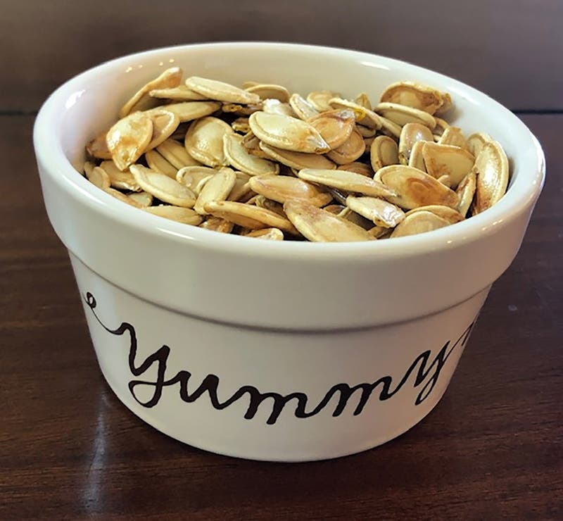 Don't toss out those pumpkin seeds. Instead, turn them into a delicious snack. 