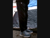 The suspect was described as a white man who appeared to be wearing a black beanie, black facemask, a black North Face-style jacket with a red or orange sweatshirt underneath, black sweatpants, and light blue or gray Hoka running shoes.​