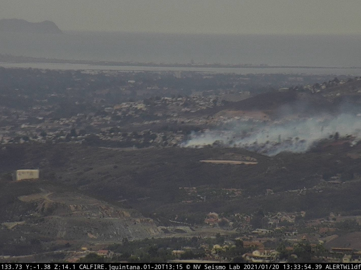 The blaze threatened structures along Avenida Roberta and Calle Los Arboles, according to Cal Fire.