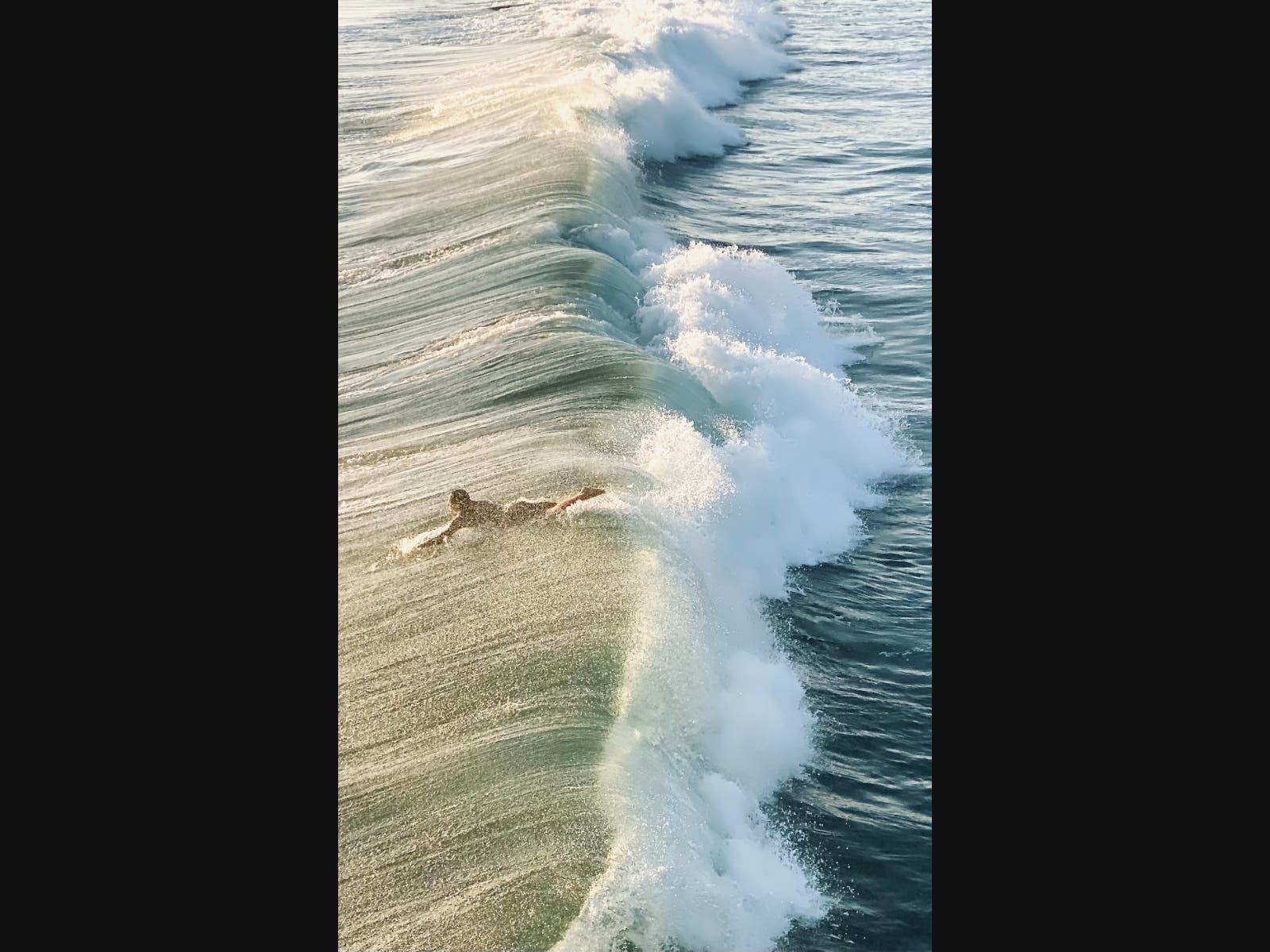 Surfer at Pacific Beach, California 