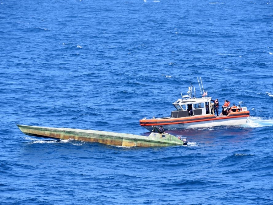 Coast Guard Cutter Bertholf (WMSL 750) boarding teams interdict a low-profile vessel in the Eastern Pacific Ocean, seizing more than 4,380 pounds of cocaine, Feb. 1, 2021. 
