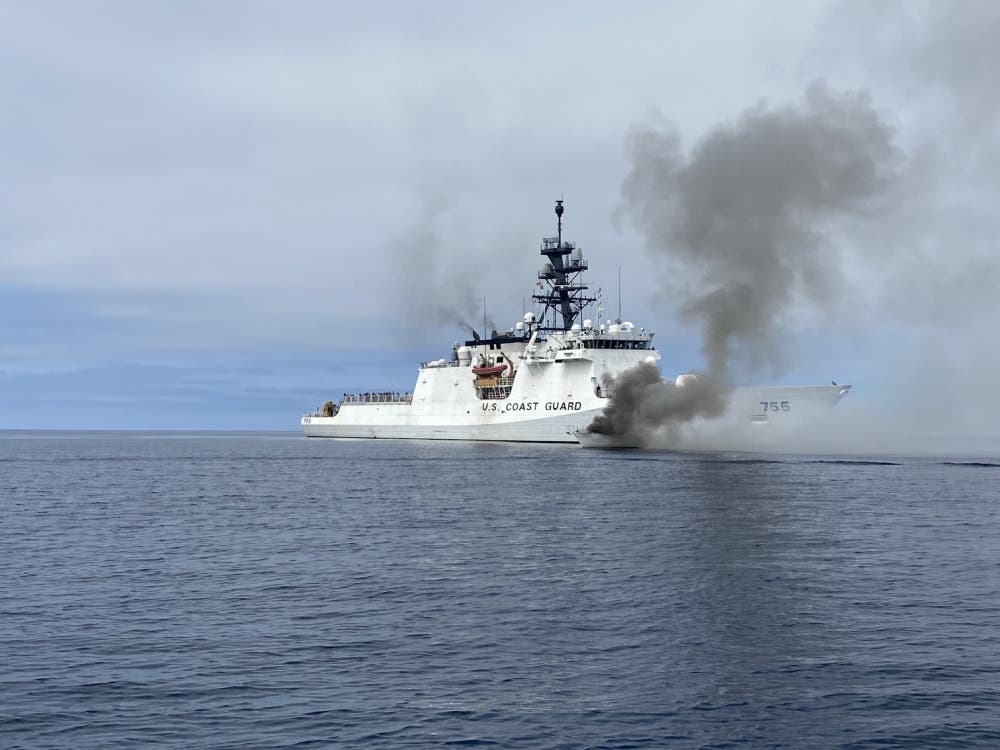 Coast Guard Cutter Munro crewmembers work with Coast Guard Cutters Haddock and Benjamin Bottoms to extinguish a vessel fire off the coast of San Diego, July 15, 2021. The vessel left the Oceanside harbor heading towards Carlsbad when it was seen on fire.