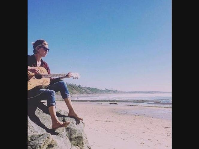 Playing guitar in Encinitas, California. 