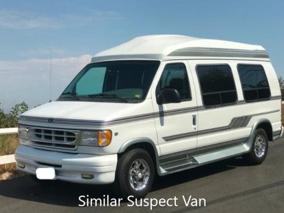The van the suspect was driving was described as a late 1990s Ford Econoline with tinted windows and beige curtains in the back.​ The vehicle pictured is a similar van. 