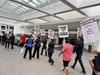 Roughly 600 workers represented by Unite Here Local 30​ went on strike outside Hilton Bayfront San Diego, which is located next to San Diego Convention Center.