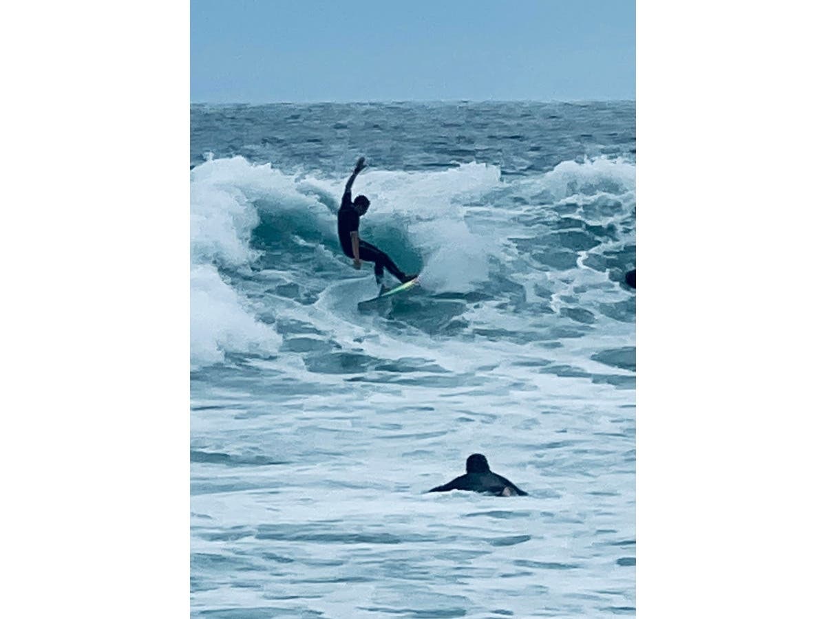 A surfer in Carlsbad, California. 