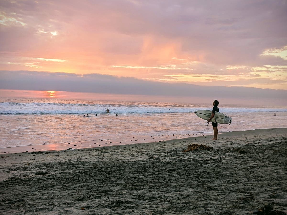 A surfer at Cardiff Reef in Encinitas, California. 