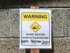 Officials posted signs along a two-mile stretch of the beach as a precaution.