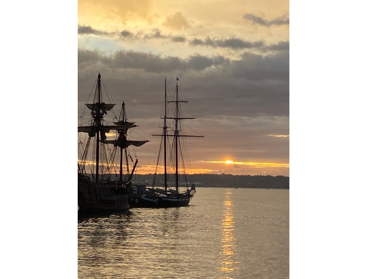 The sun sets over the Embarcadero in San Diego, California. 