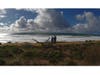 Two people enjoying the view at Carlsbad State Beach.
