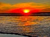 The sun sets over Cardiff State Beach.
