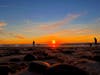 The sun sets over Cardiff State Beach.