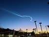 A Falcon 9 rocket seen from Oceanside. 