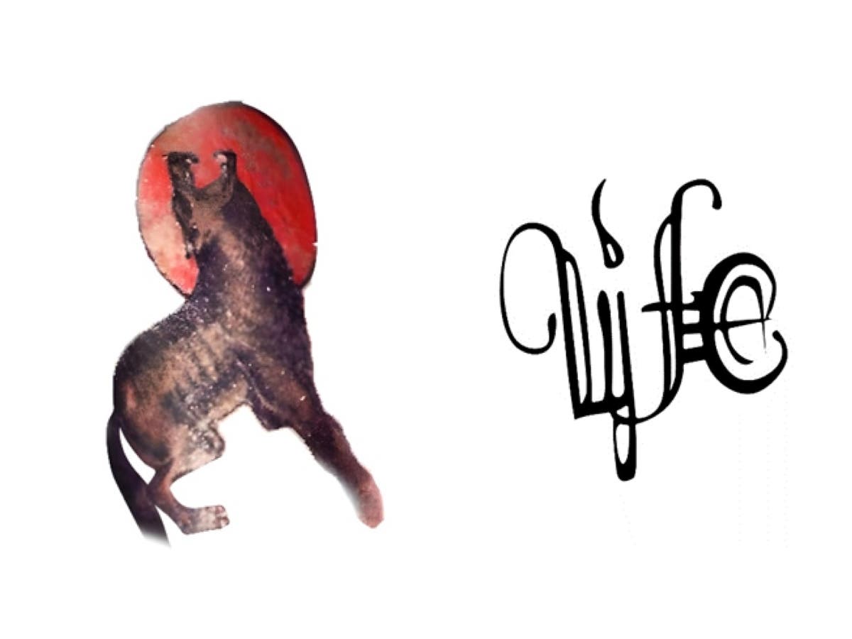 The man's left forearm had tattoos of a wolf howling at a red moon and the word "Life" or "Wife."