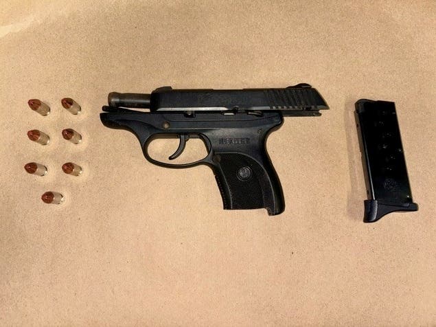 A 17-year-old boy was arrested after officers found a loaded handgun under the right front passenger seat of a car stopped for a traffic violation, police said.