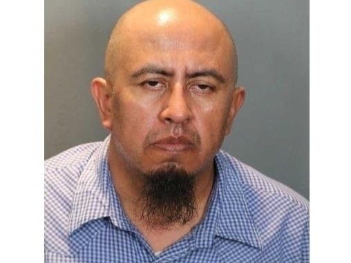 A Hawthorne man accused of killing his ex-girlfriend in Orange County and fleeing to Mexico was detained at the U.S. border Saturday on suspicion of murder, police said.