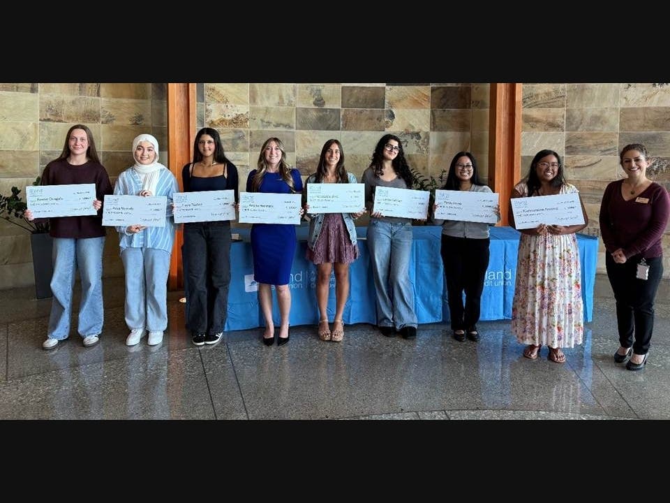 The students were recognized during a ceremony at the credit union's headquarters in San Diego.