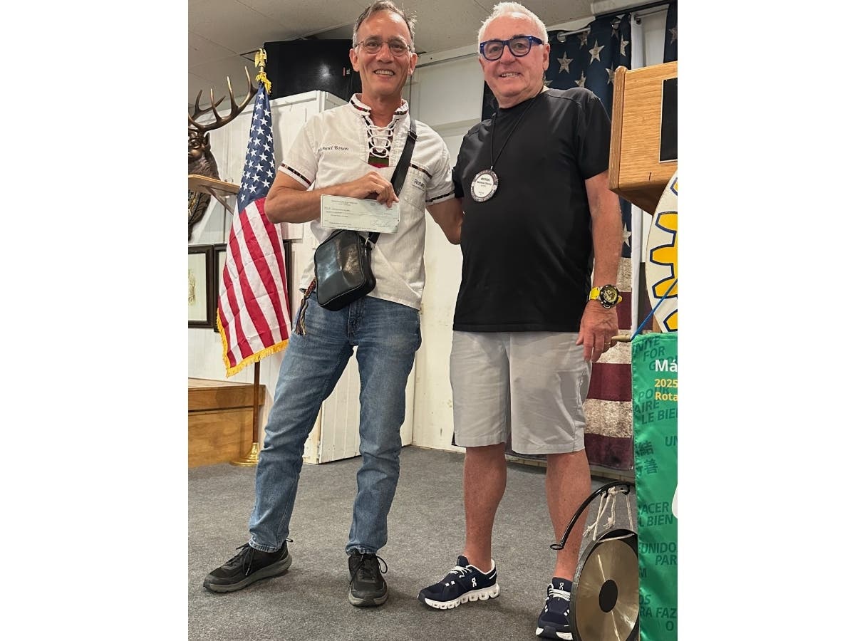 Encinitas Rotary Club member Michael Clancy (right) with Michael Rosen (left), who represented the Guatemalan Rotary club.