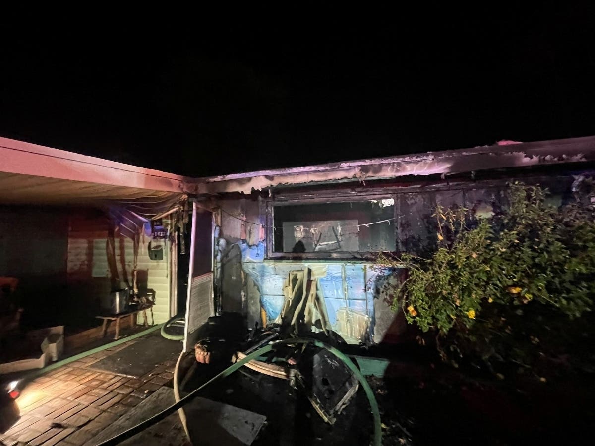 The front of the home was fully engulfed in flames when firefighters arrived, officials said. 